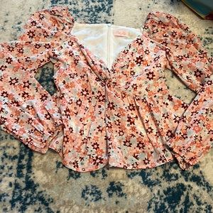 Pink lily pink floral long sleeve top with zipper back. Size small